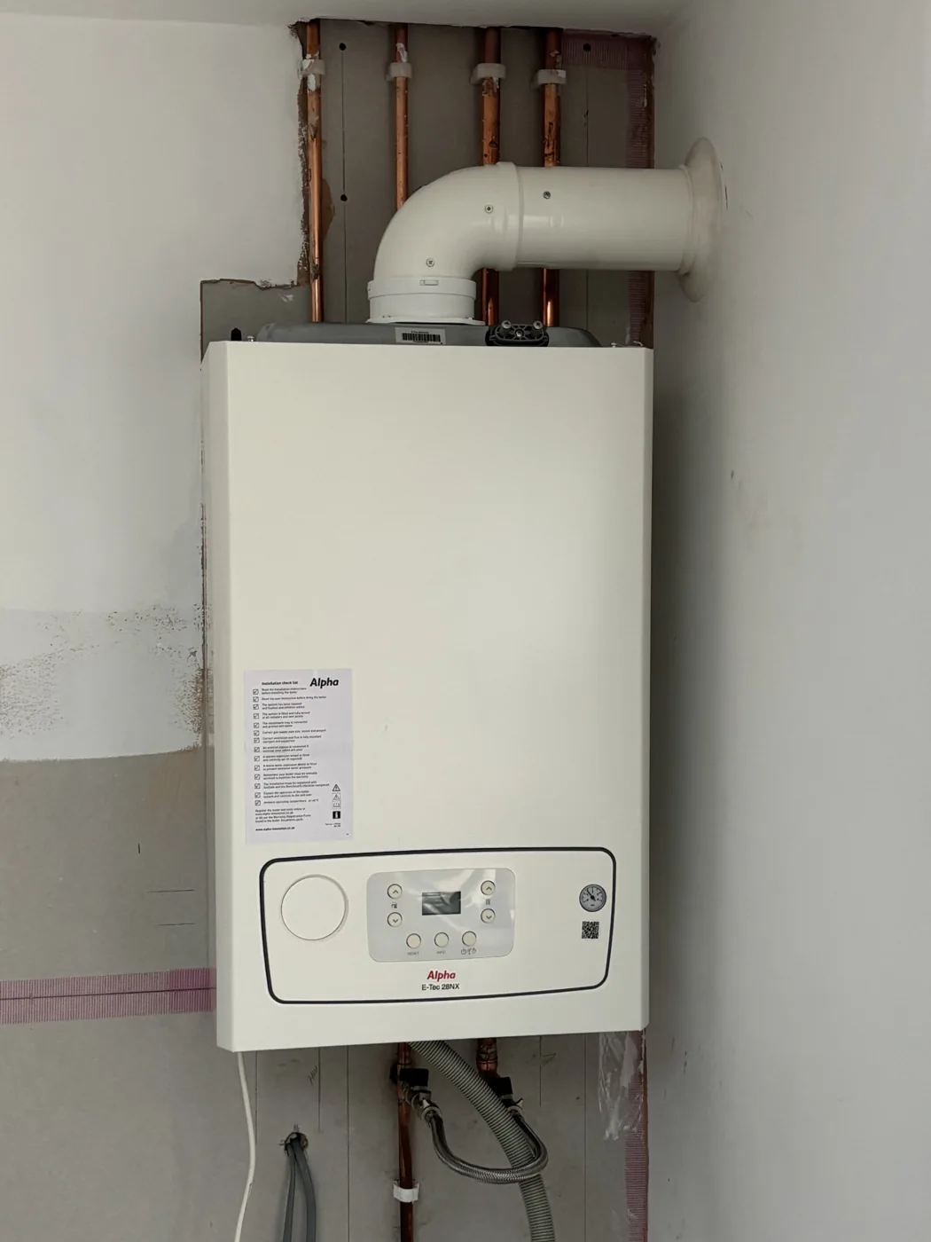 Installed wall-mounted domestic boiler